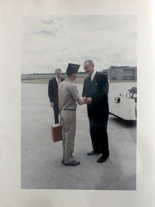 [Photo Album of President Lyndon Johnson and his Defense Secretary].