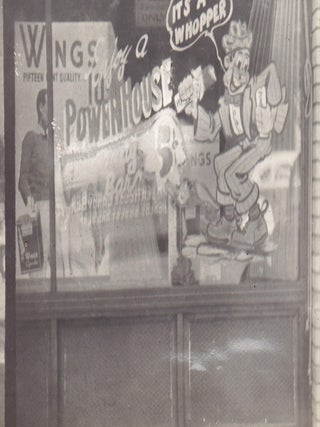 Photo Album Documenting Power House Candy Bar Window Paintings and Other Marketing Efforts.