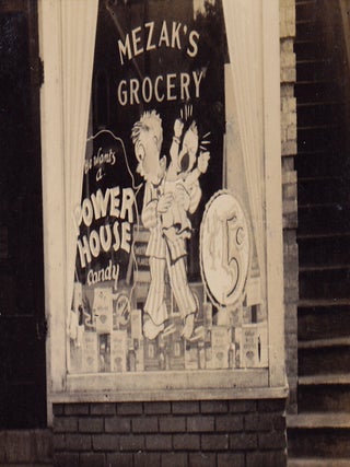 Photo Album Documenting Power House Candy Bar Window Paintings and Other Marketing Efforts.
