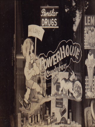 Photo Album Documenting Power House Candy Bar Window Paintings and Other Marketing Efforts.