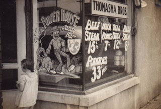 Photo Album Documenting Power House Candy Bar Window Paintings and Other Marketing Efforts.